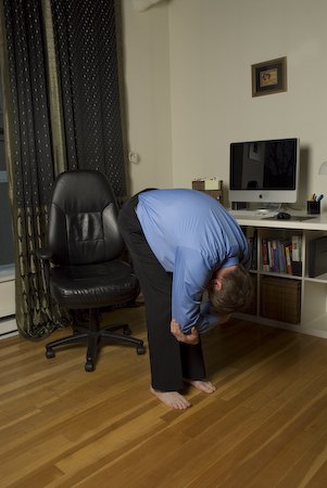 Standing Forward Bend - Innergy Corporaate Yoga Inc.