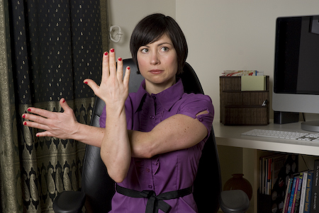 Arm Stretch - Innergy Corporate Yoga Inc.